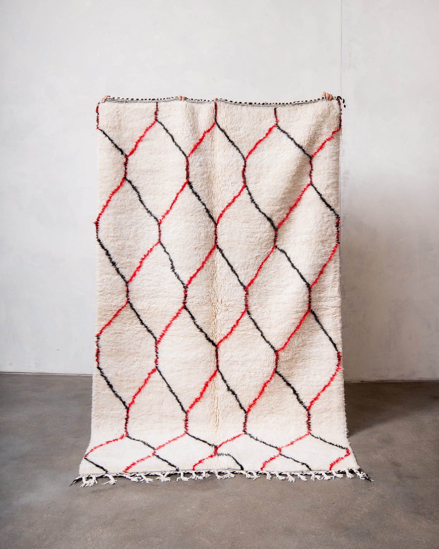 Modern, designer, handcrafted Berber rug from Morocco. Beniourain carpet with beautiful colours and patterns and fluffy wool texture.